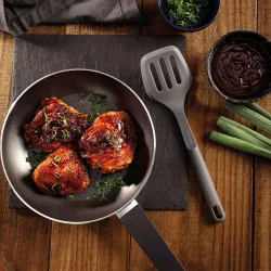 Лопатка с прорезями силиконовая Tramontina Softta серая (25850/160)