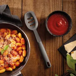 Ложка кухонна з прорізами силіконова Tramontina Softta сіра (25853/160)